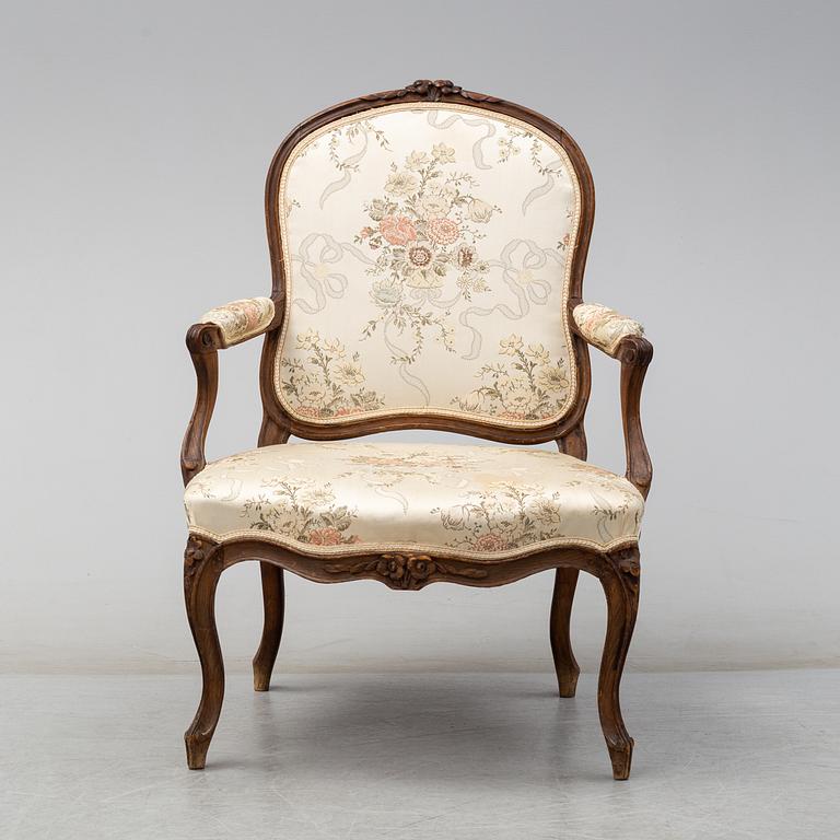 A mid 18th century Rococo arm chair.