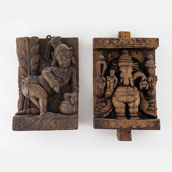 Two Indian carved wooden reliefs, around 1900.