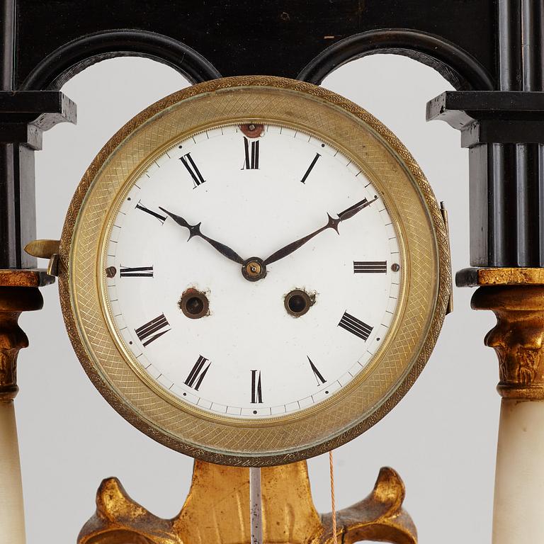 A late Empire table clock, mid 19th Century.