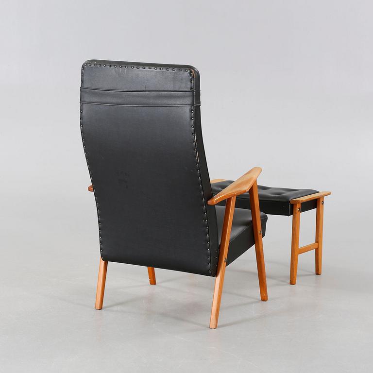 A 1950/60s arm chair and stool.