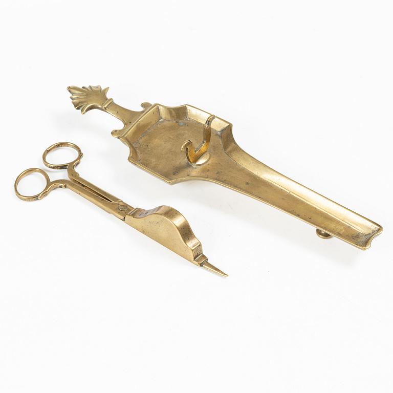 A Swedish/North European baroque brass wick snuffer and tray, circa 1700.
