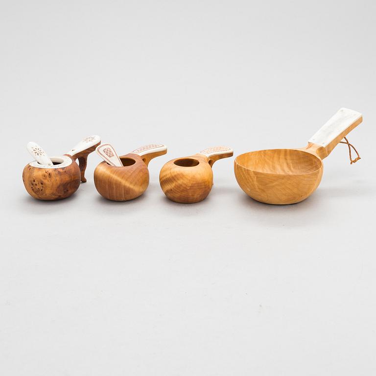 A set of four signed birch and reindeer horn kuksa / guksi cups, sami handicraft / duodji, later half of 20th century.