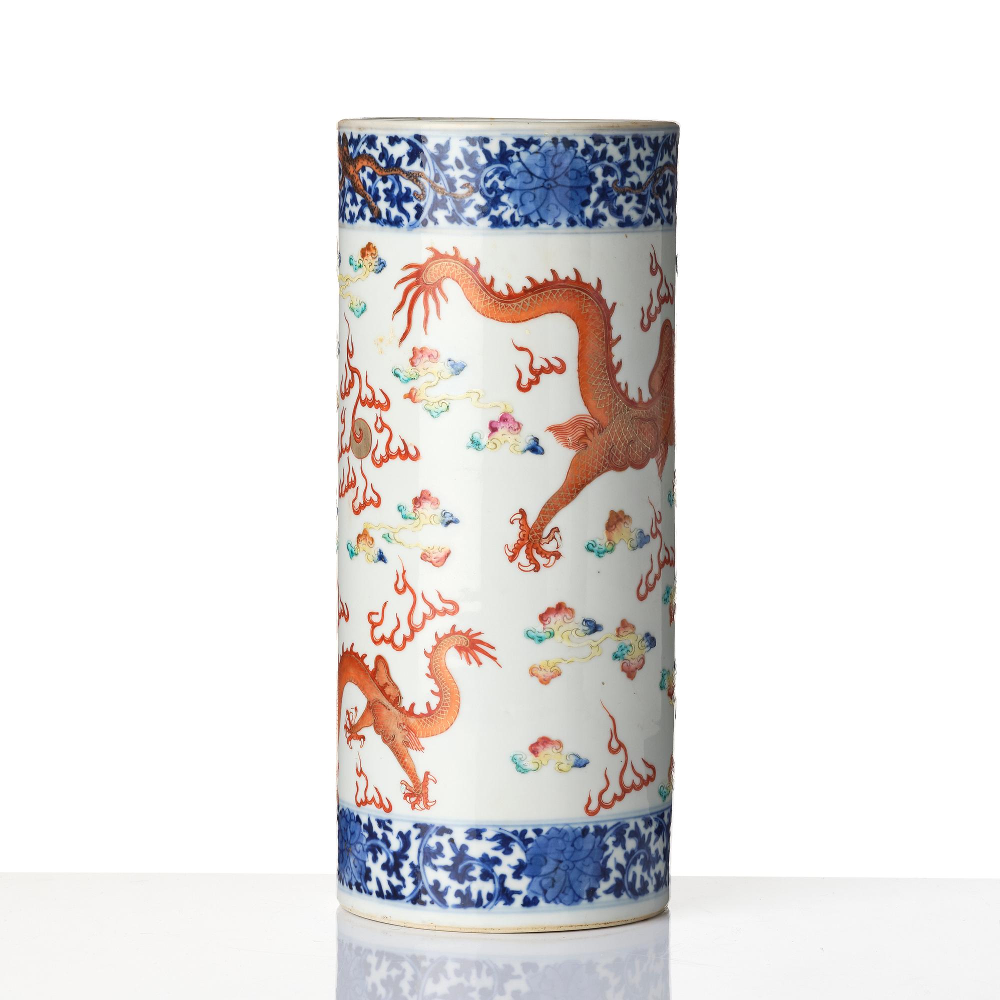A Chinese 'dragon' porcelain brush stand, Qing dynasty, Guangxu mark and period (1875-1908).