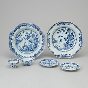 Two blue and white dishes and two cups with dishes, Qing dynasty, Qianlong (1736-95) and Kangxi (1662-1722).