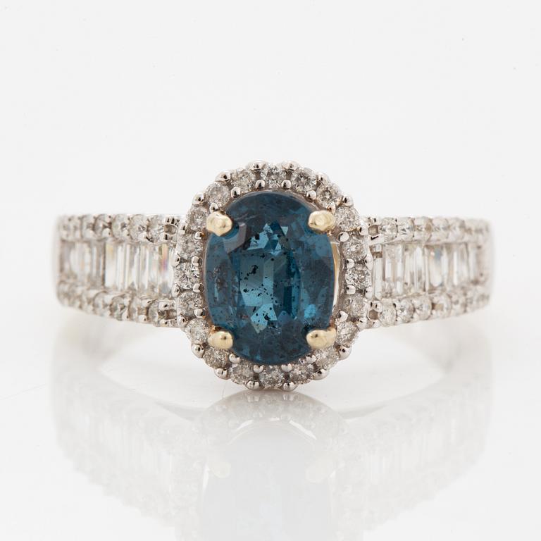 Oval faceted kyanite and diamond ring.