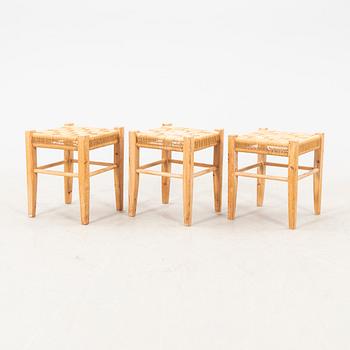 A set of three Danish 1970/80s pine stools.