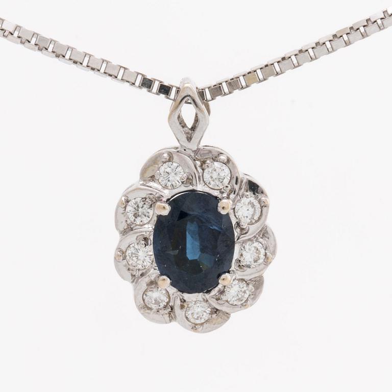 PENDANT and chain 18K whitegold 1 sapphire approx 6 x 4 mm and brilliant-cut diamonds approx 0,25 ct in total.