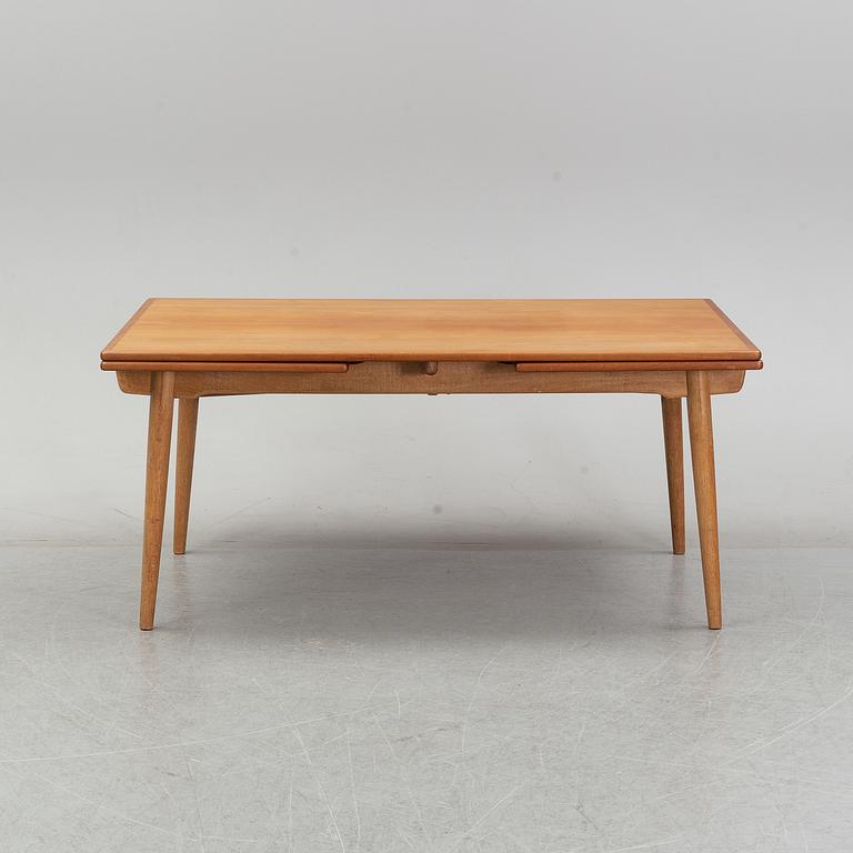 Hans J Wegner, a model 'AT-312' teak veneered dining table, Andreas Tuck, Denmark.