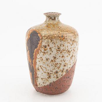 Rolf Palm,  a signed and numbered 233 stonewre vase.