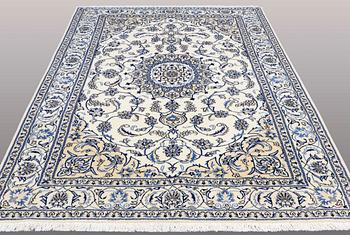 A CARPET, Nain, ca 295 x 203 cm.
