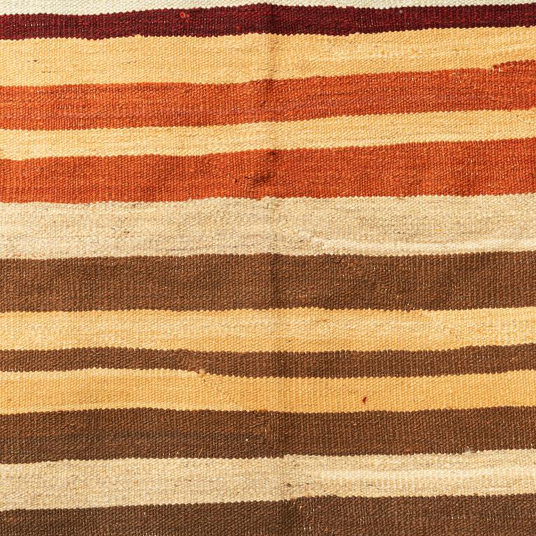 A carpet, flat weave, ca 227 x 175 cm.