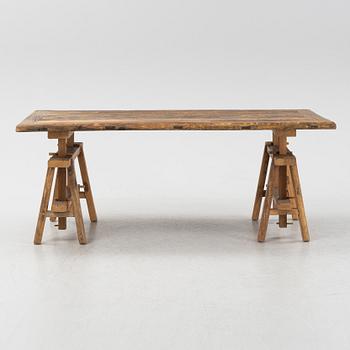 A Walles & Walles dining table.