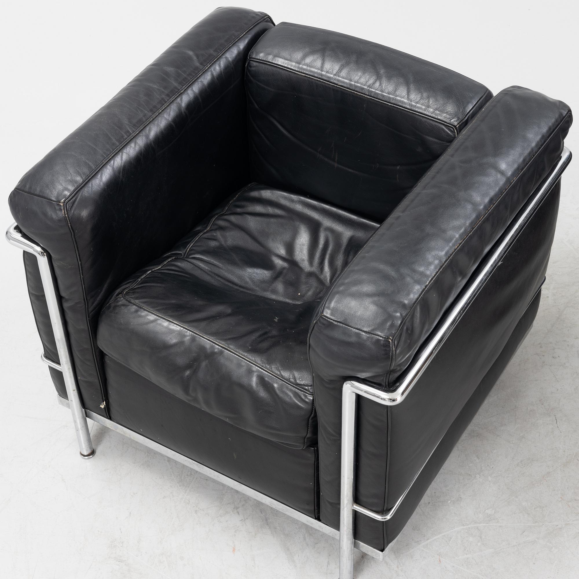 Le Corbusier, Pierre Jeanneret & Charlotte Perriand, a pair of 'LC2' easy chairs, Cassina.