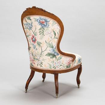 A late 19th century armchair in Rococo style.
