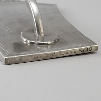 A couple of Wall sconcesof  tin, Astrid M Aagesen, Helsingborg 1920th.