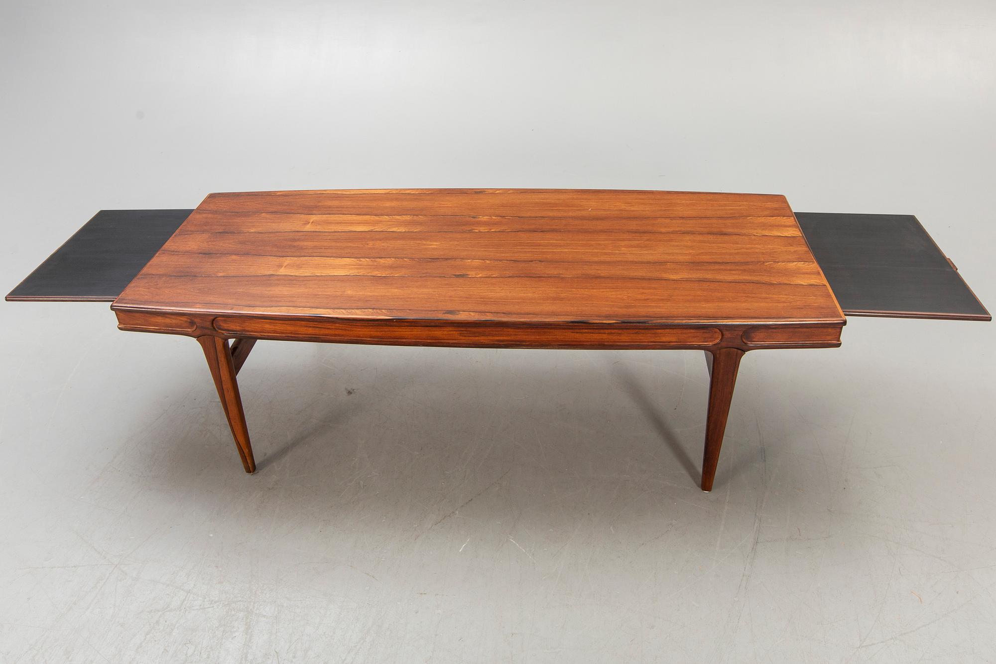 A Johannes Andersen jacaranda coffee table model F102, 1960s.