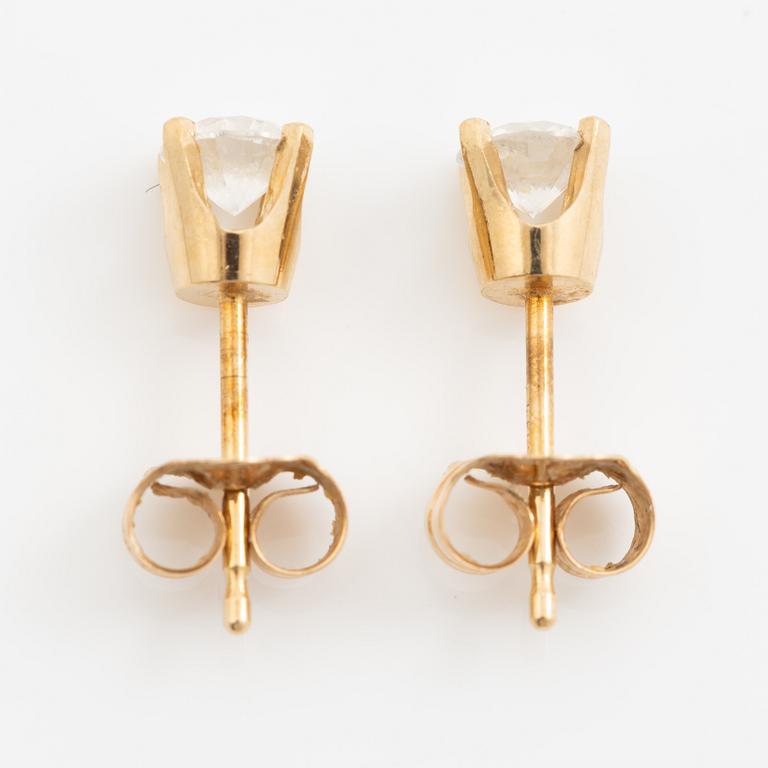Earrings, a pair, gold with brilliant-cut diamonds.