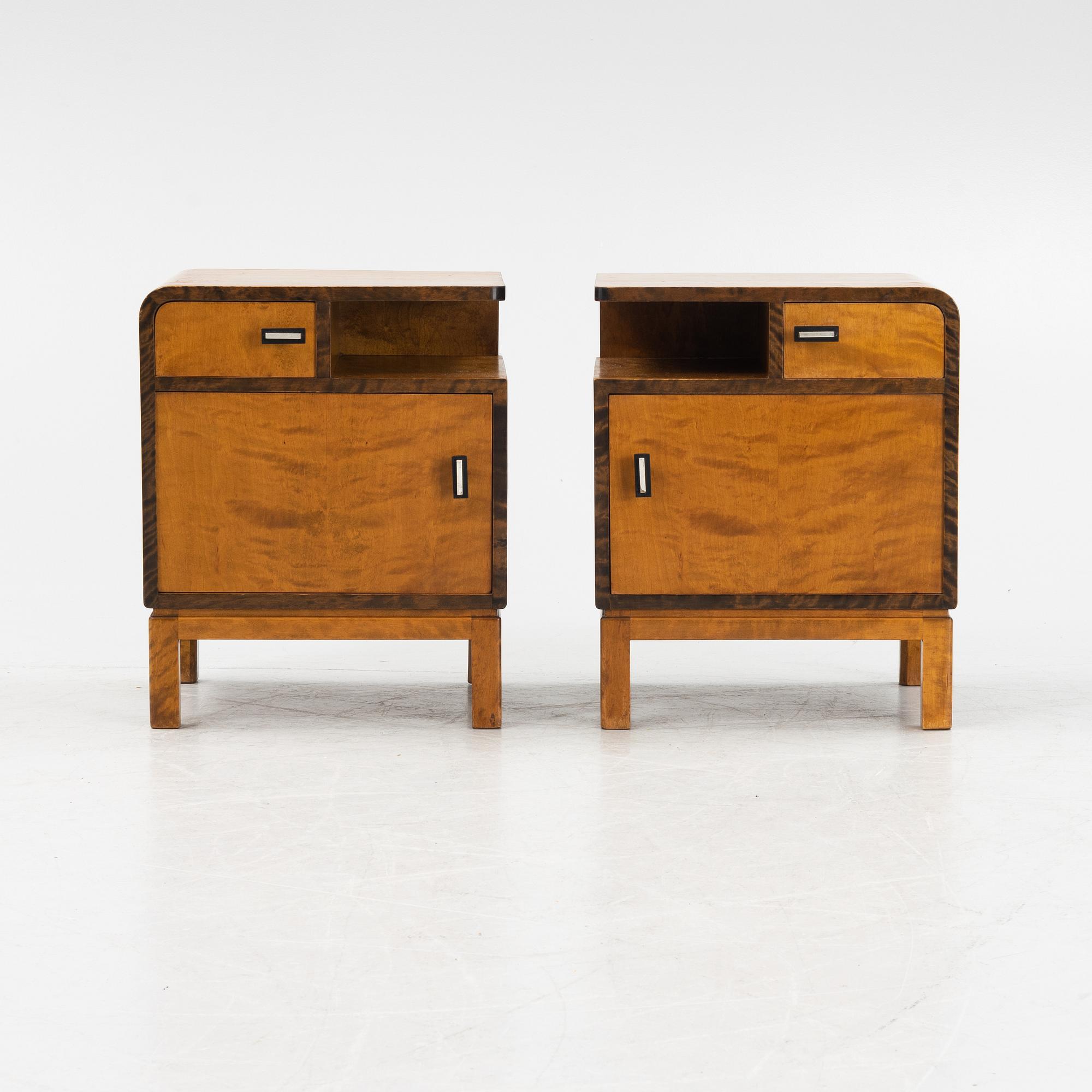 A pair of birch veneered 1930's bedside tables.