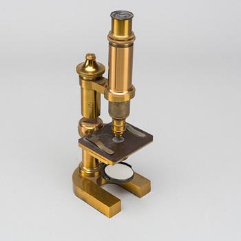 A Leitz Wetzlar monocular brass microscope around 199.