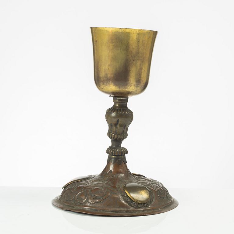 A silvered and gilt copper chalice, presumably German, first part 18th century.