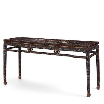 1047. A  Chinese black lacquered altar table with mother of pearl inlay, 17th /18th Century.