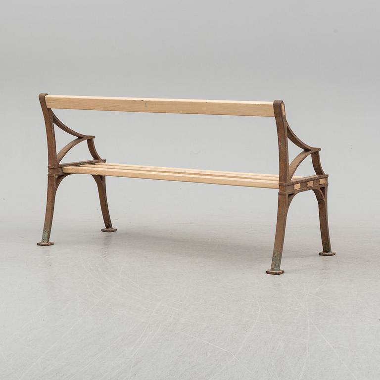 A late 19th century garden sofa by Byarum.