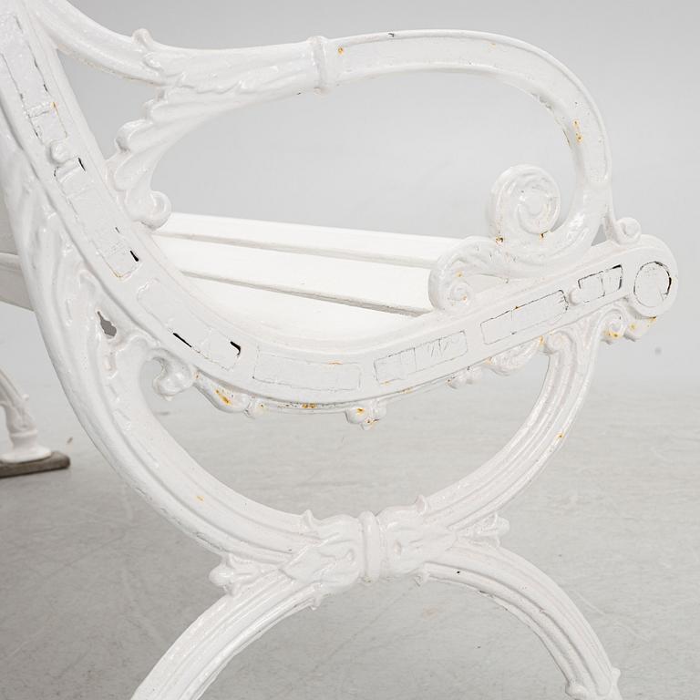 A cast iron garden bench, 20th century.