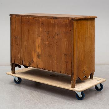 A 18th century rococo chest of drawers.