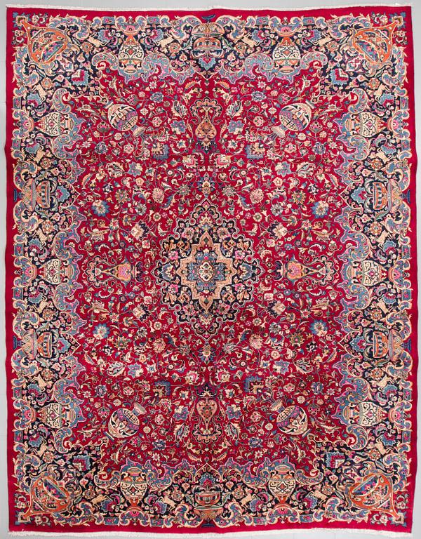 A Kashmar rug, 380 x 294 cm.