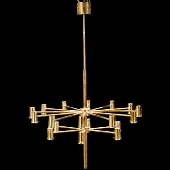 A 20th century brass and smoked glass chandelier by Hans Agne Jakobsson, Markaryd, Sweden.