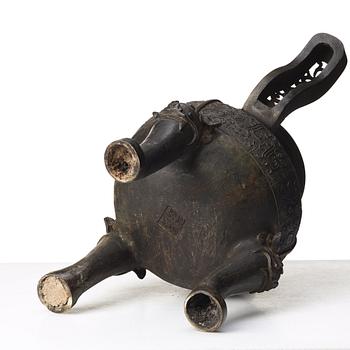 A large bronze censer with cover, presumably late Ming dynasty (1368-1644).