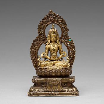 644. A cold gilt copper alloy figure of Amithayus, Tibet, 18th/19th Century.