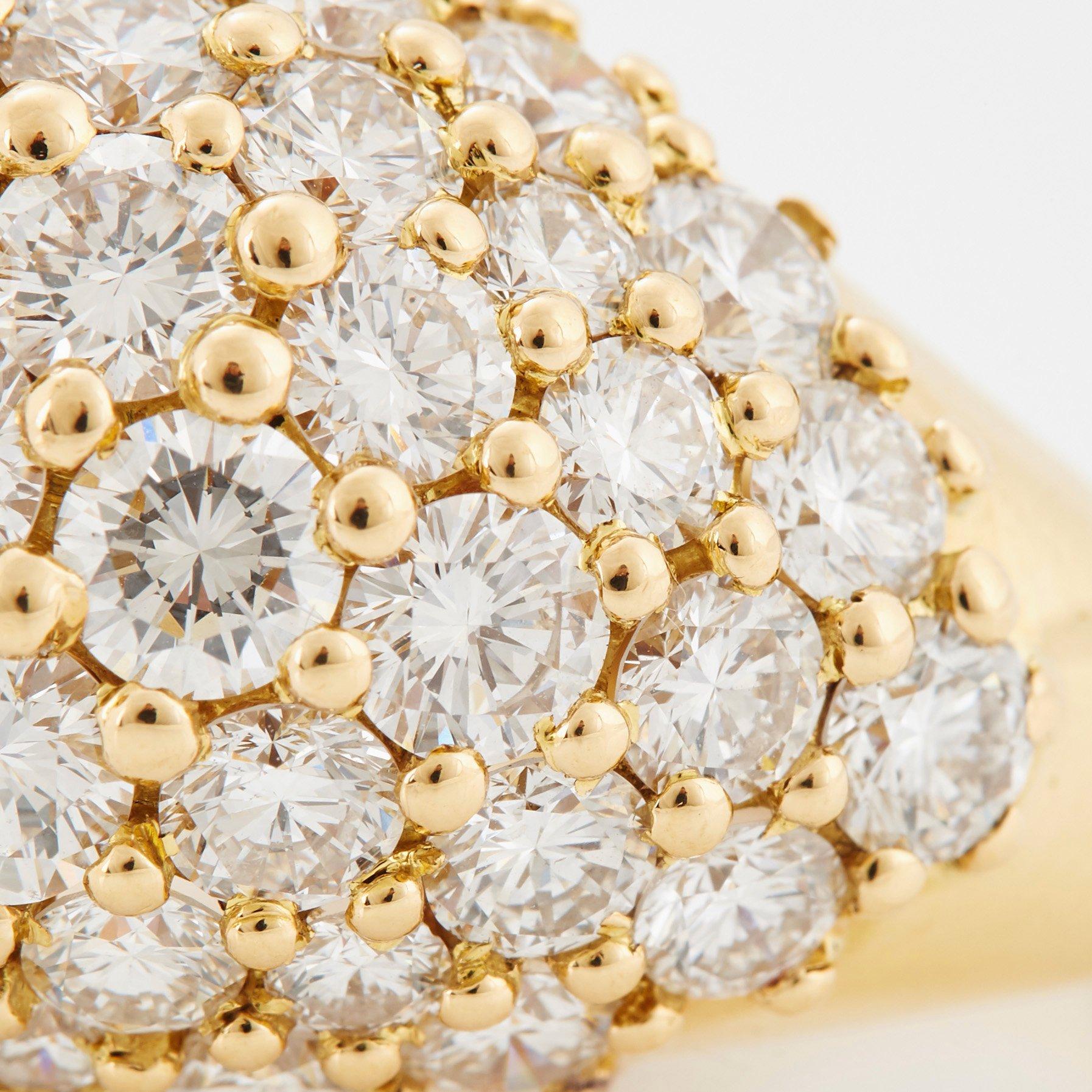Cartier "Marrakech" an 18K gold bombé ring set with round brilliant-cut diamonds.
