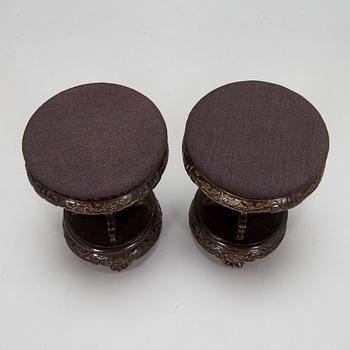 A pair of Chinese stools, 20th century.
