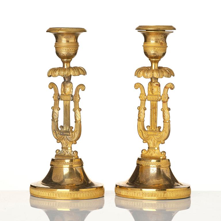 A pair of Swedish Empire ormula candlesticks.