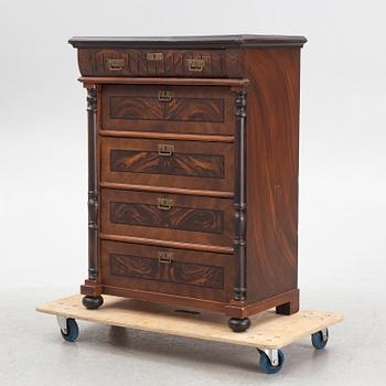 A chest of drawers, circa 1900.