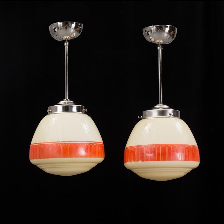 A pair of 1940´s Pukeberg ceiling light. Hieght ca 41 cm.