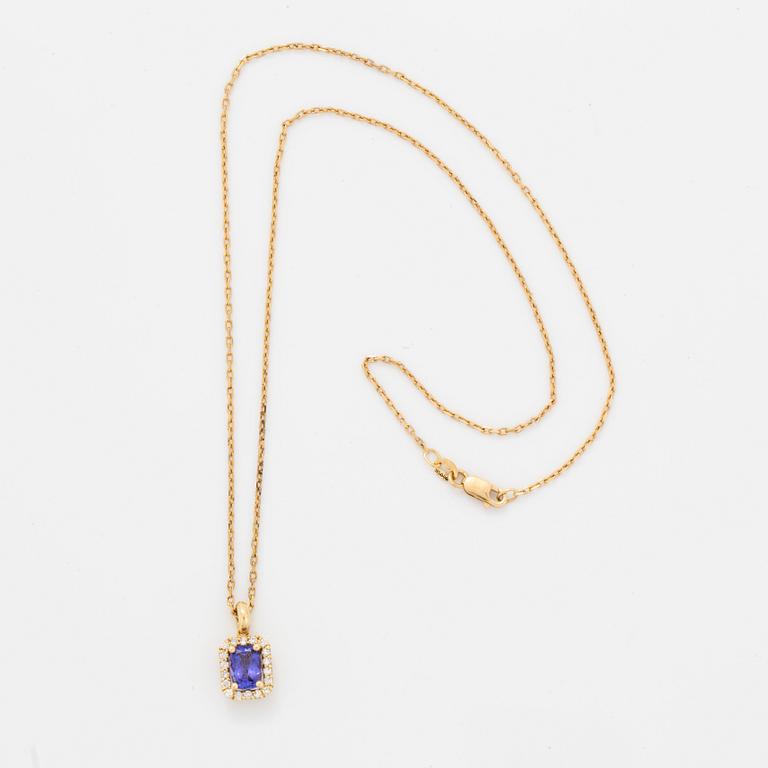 An 18K gold necklace set with a faceted tanzanite.