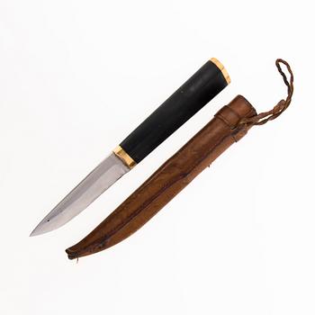 TAPIO WIRKKALA, PUUKKO-KNIV, rostfritt stål, nylon och mässing, Hackman Finland.