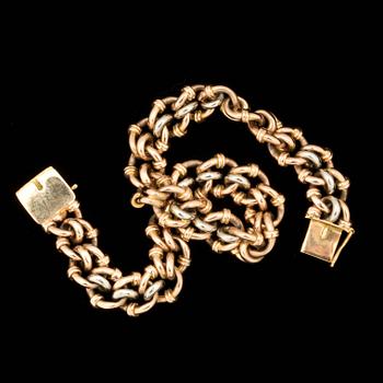 ARMLÄNK, 18 k vit och rött guld. Vikt ca 32 g.