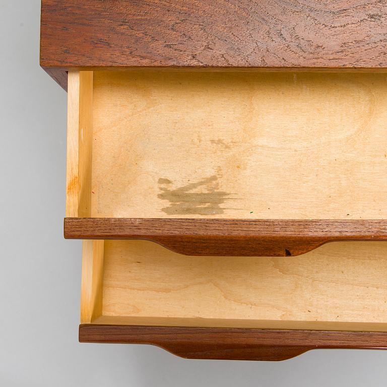 A mid-20th century Danish teak chest of drawer.