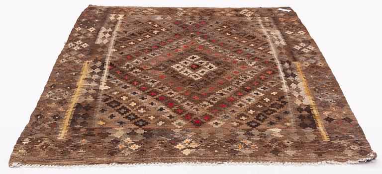 A Kilim carpet, 243 x 169 cm.