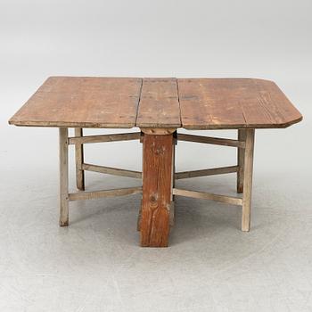 A drop-leaf table, 19th century.