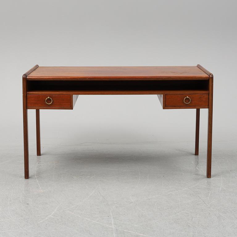 A mahogany desk, mid 20th Century.