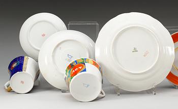 A set of seven Russian commemorative cups with saucers and a dinner plate, 20th Century. Some Lomonosov.