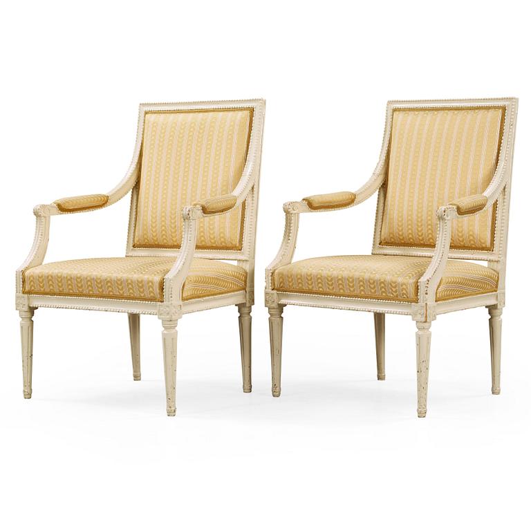 A pair of Gustavian late 18th century armchairs in the manner of Johan Lindgren.