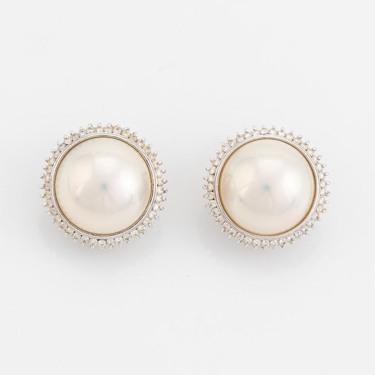 Mabe pearl and brilliant cut diamond earrings.