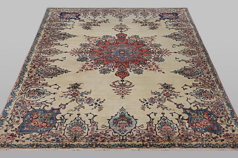 A carpet, old Kerman, ca 370 x 270 cm.