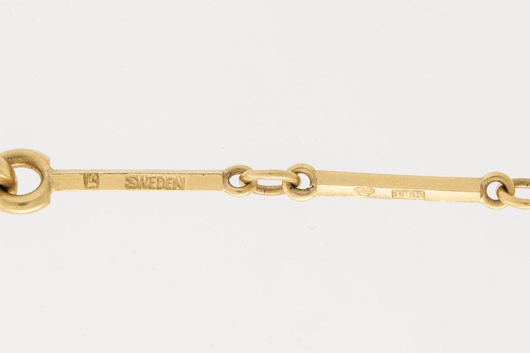 Wiwen Nilsson, halsband / fickurskedja, 18K guld, Lund 1965.