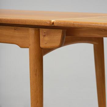 Hans J. Wegner, an "AT-312" dining table, Andreas Tuck, Denmark, 1950s-60s.